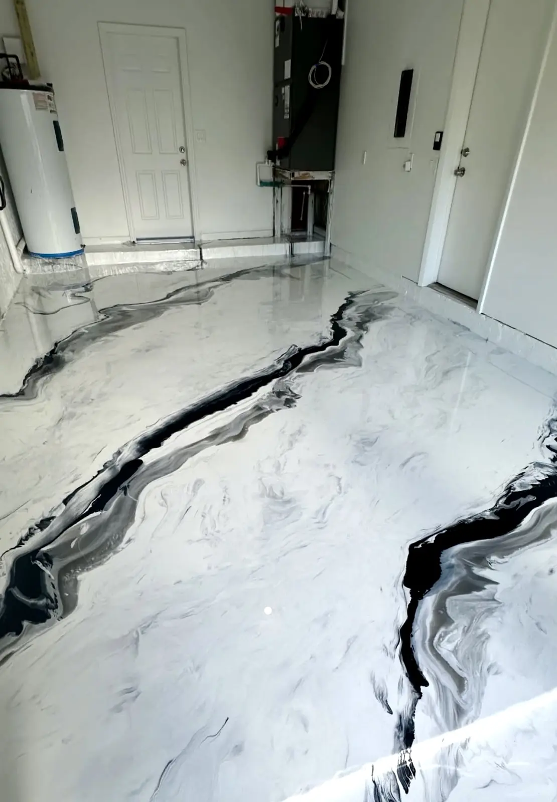 Showroom seamless metallic epoxy pour